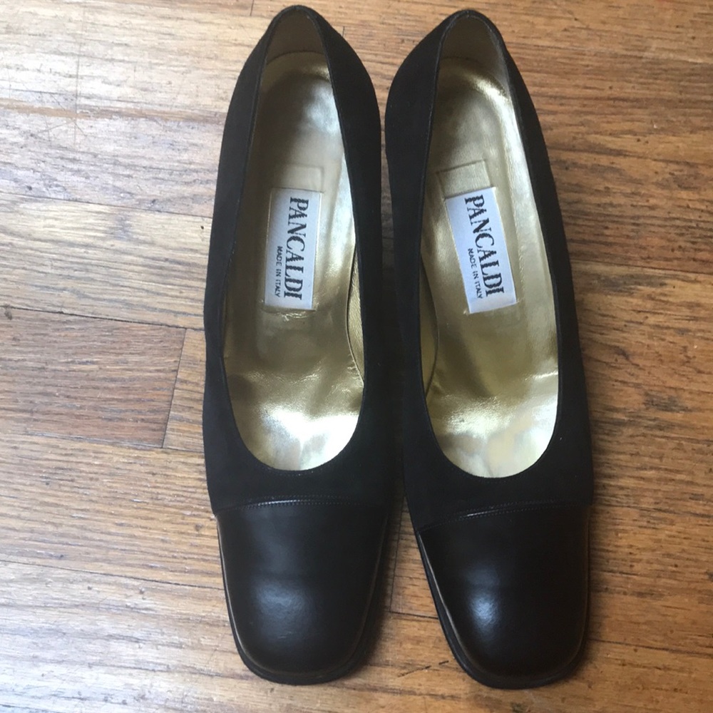 Suede and leather cap toe heel.